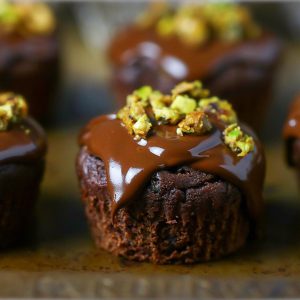 Double Chocolate Zucchini Muffins Topped with Candied Pistachios